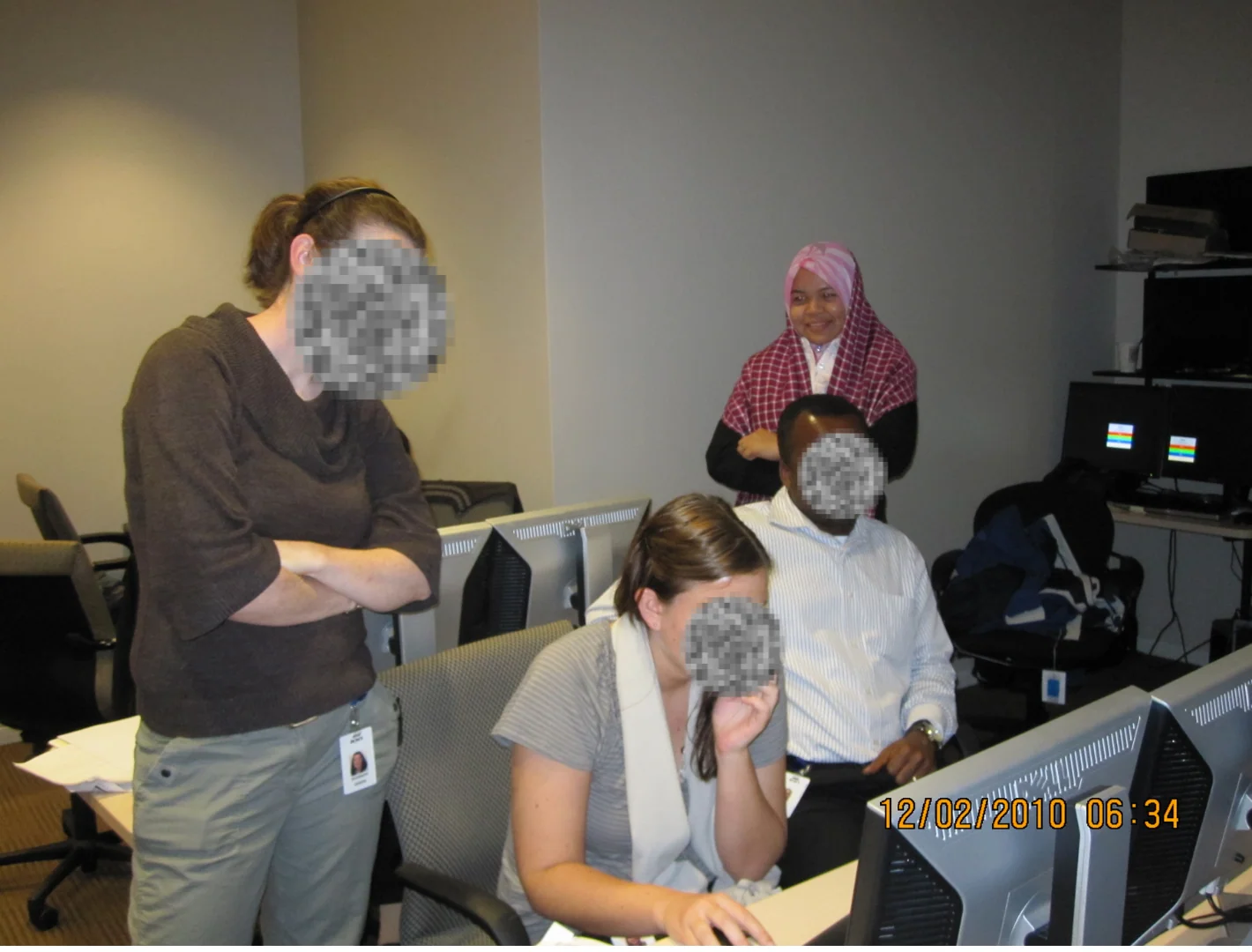 Working on data migration with a colleague during training in Houston, Texas